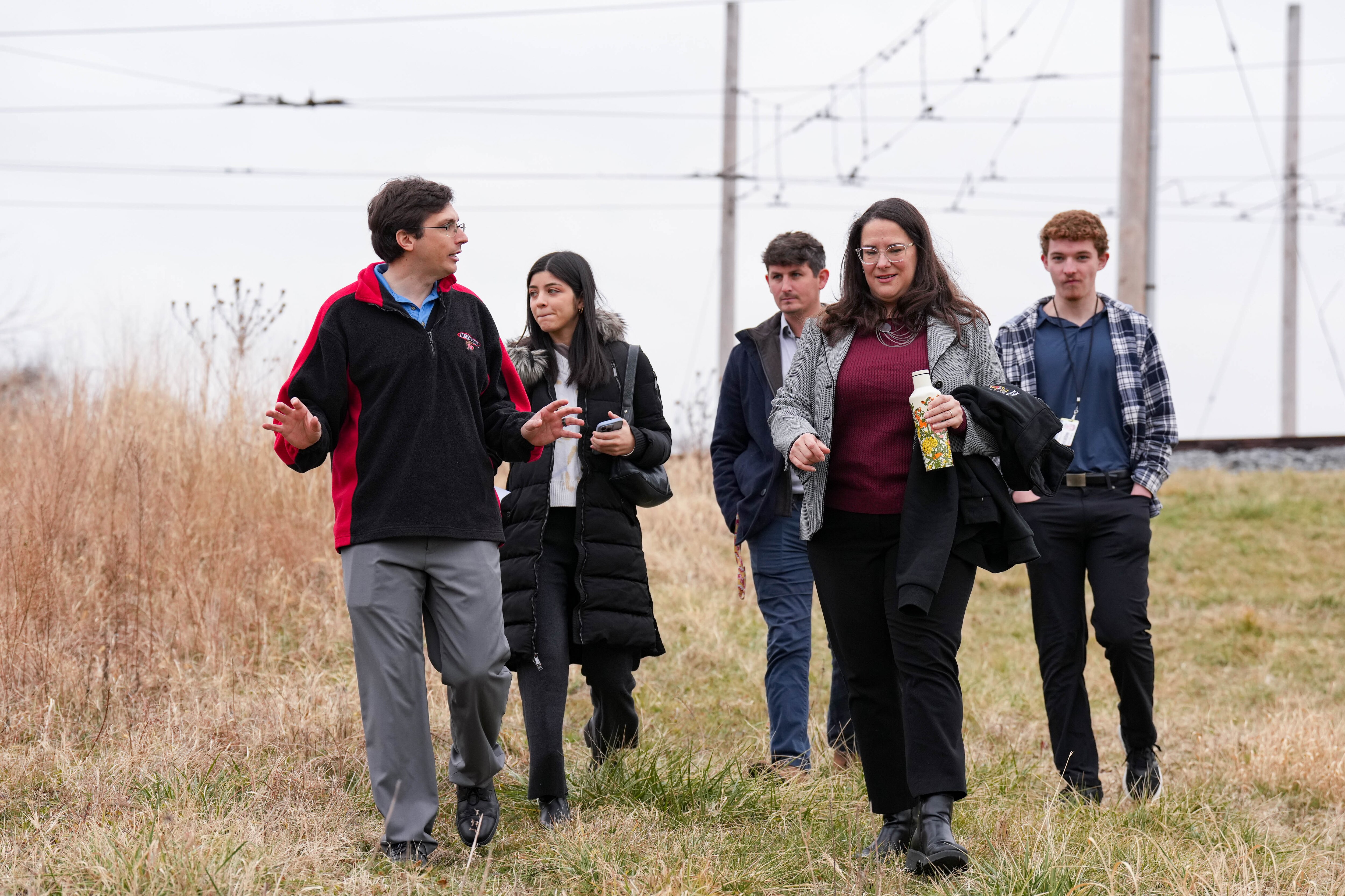 James Hyde, left, the Maryland Mesonet manager, leads a tour of the mesonet station following a news conference to announce Montgomery County’s Fiscal Year 2025 Climate Action Plan Annual Report on Tuesday.