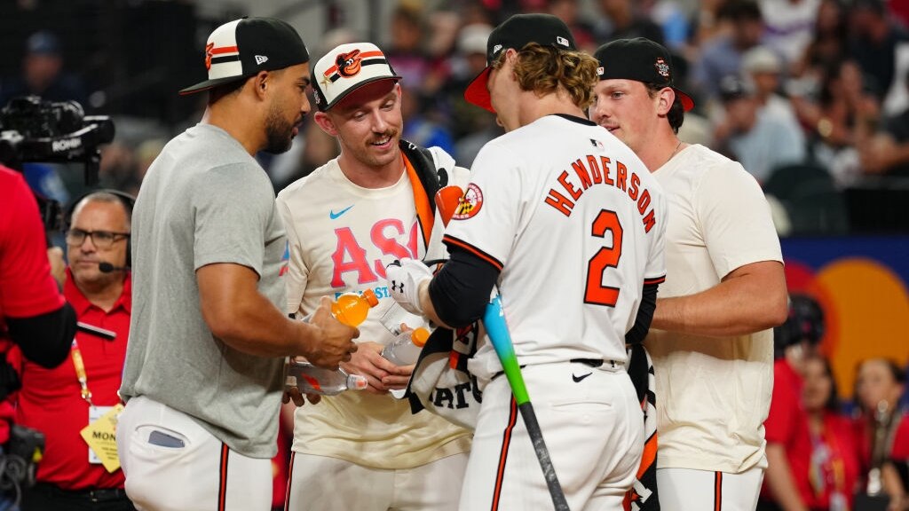 ARLINGTON, TX - JULY 15: Anthony Santander #25, Jordan Westburg #11, Gunnar Henderson #2 and Adley Rutschman #35 of the Baltimore Orioles interact during the 2024 T-Mobile Home Run Derby at Globe Life Field on Monday, July 15, 2024 in Arlington, Texas. (Photo by Daniel Shirey/MLB Photos via Getty Images)