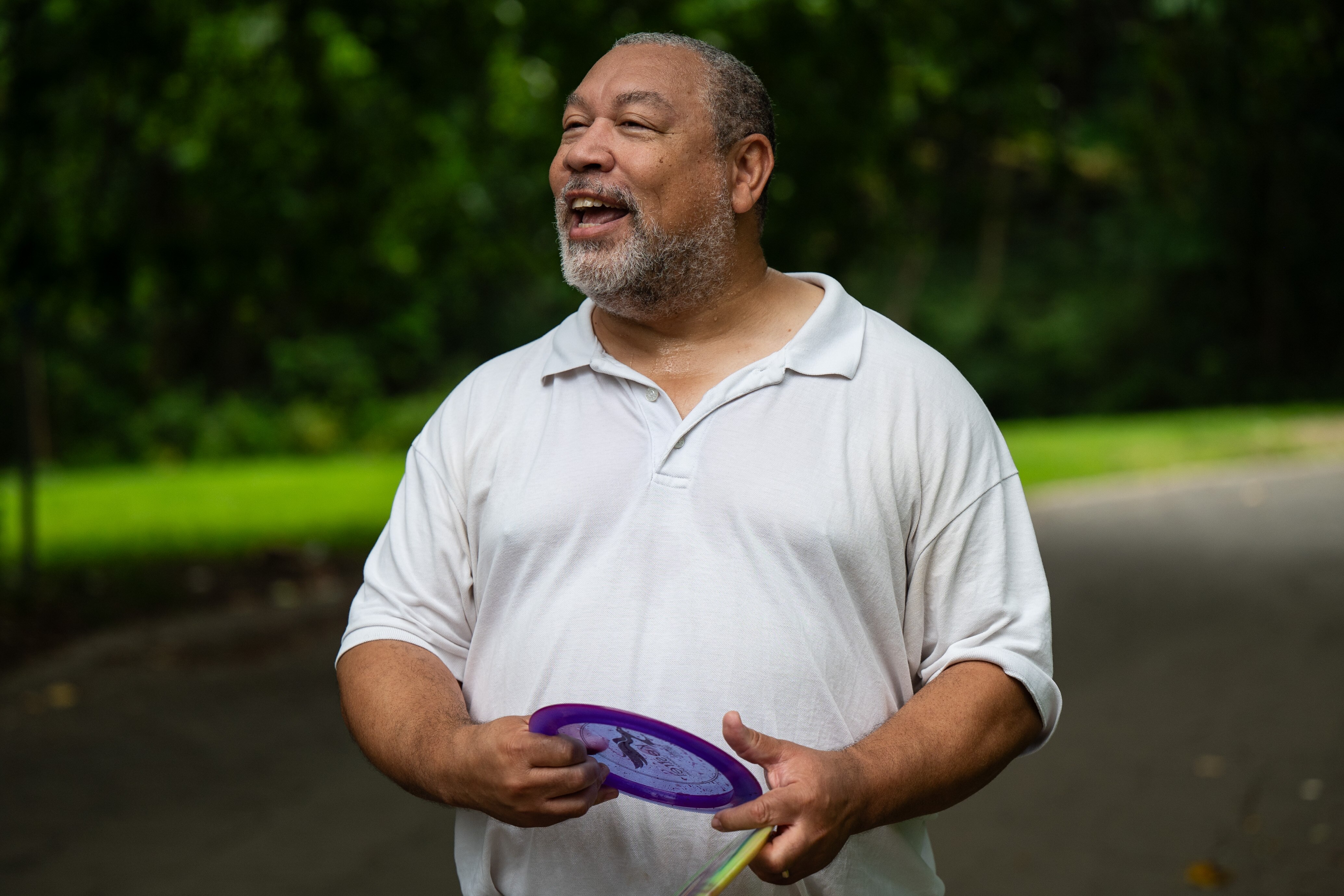 Baltimore Comptroller Bill Henry smiles during an interview.
