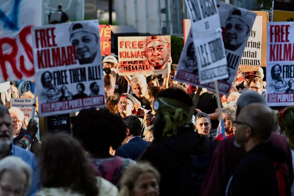 August 25, 2025 — A large crowd of supporters gathers outside the George H. Fallon Federal Building in downtown Baltimore on Monday as Kilmar Abrego Garcia reports for an immigration check-in.
