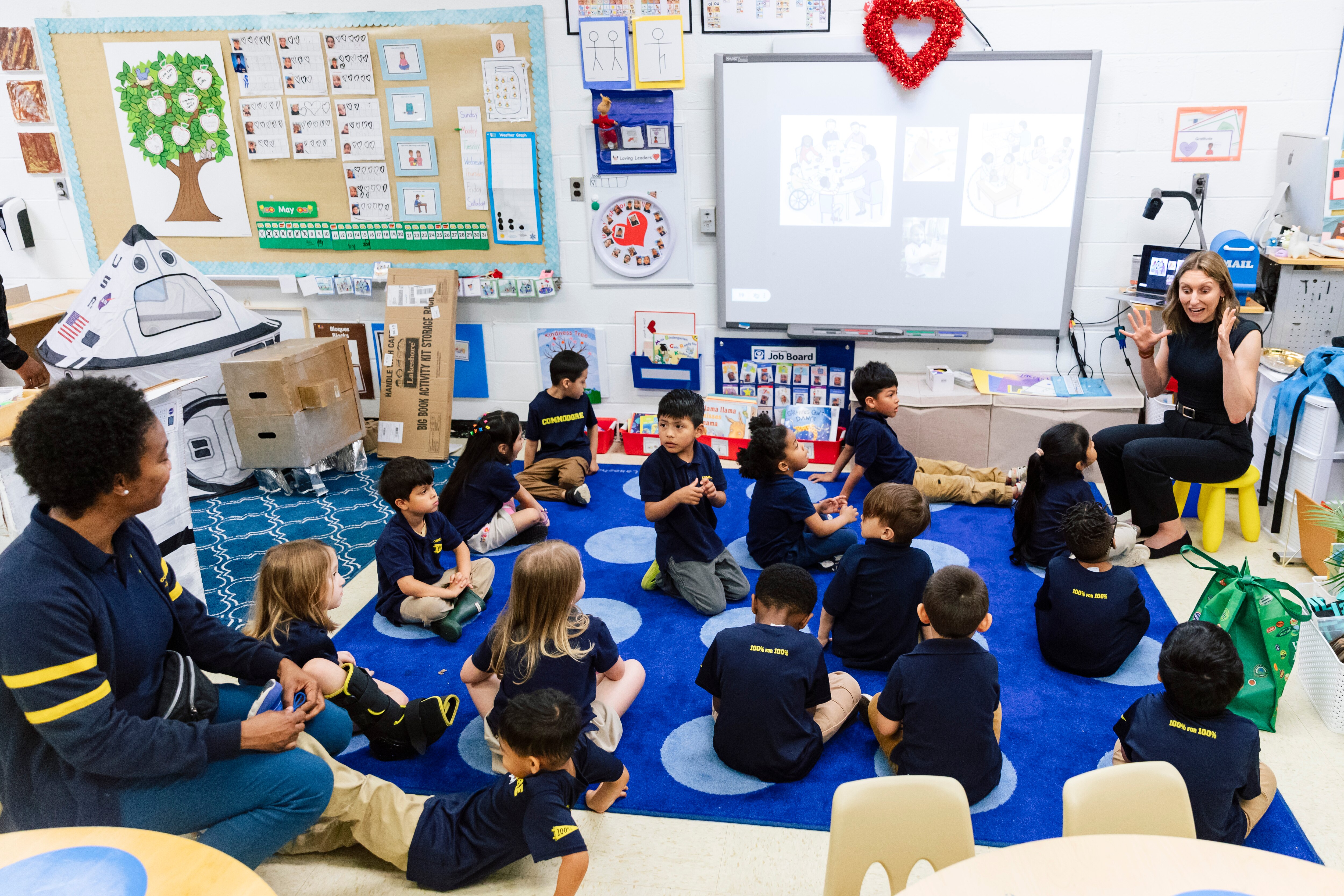 Berol Dewdney, right, leads students in a routine conclusion to class time in her pre-kindergarten class at Commodore John Rodgers Elementary School on Tuesday, May 7, 2024 in Baltimore, MD. (Wesley Lapointe / for the Baltimore Banner)