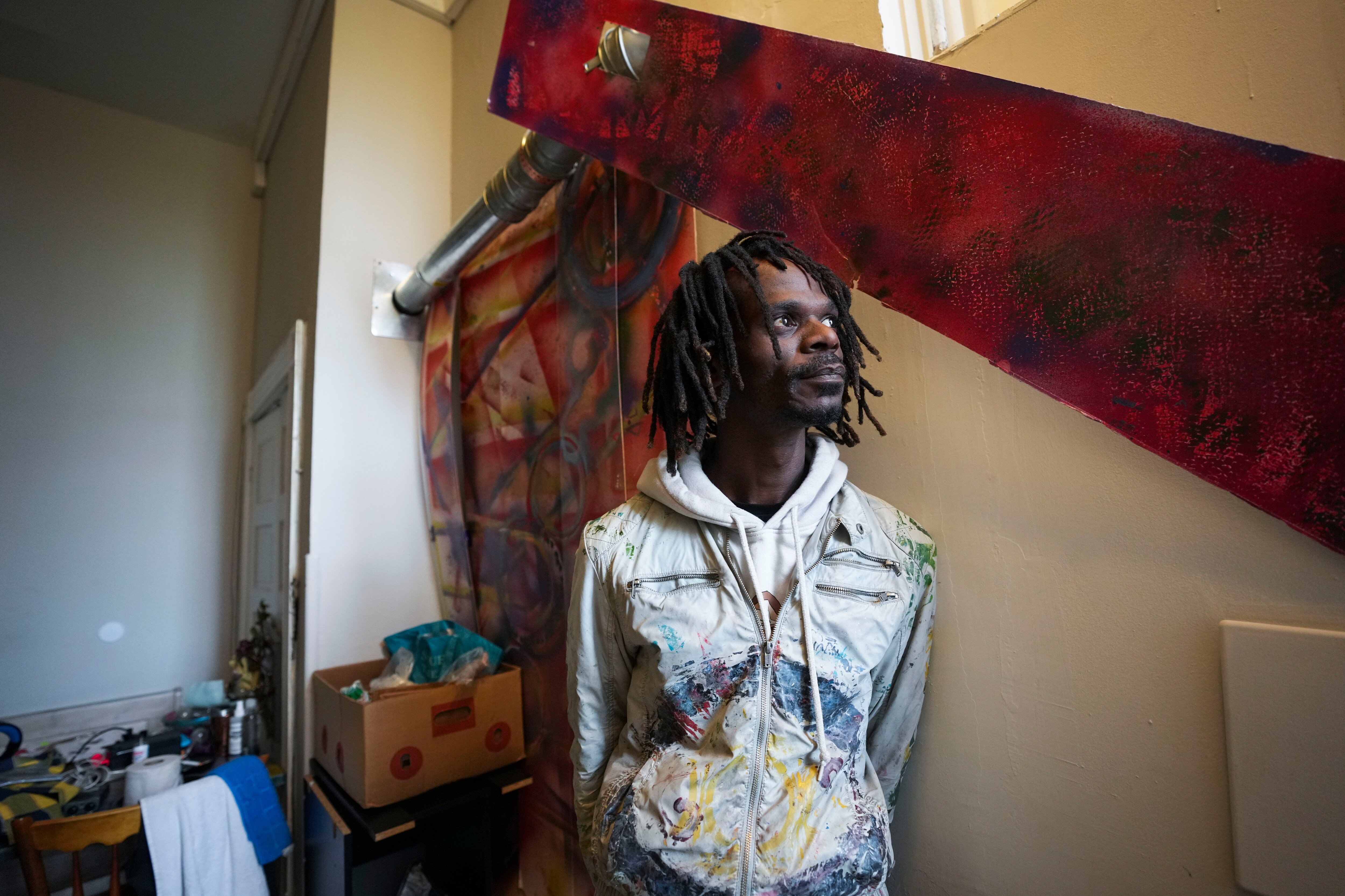 Artist Colin Williams, who formerly lived in Druid Hill Park, has obtained housing through the city and now lives in a home across the street from his previous park dwelling.