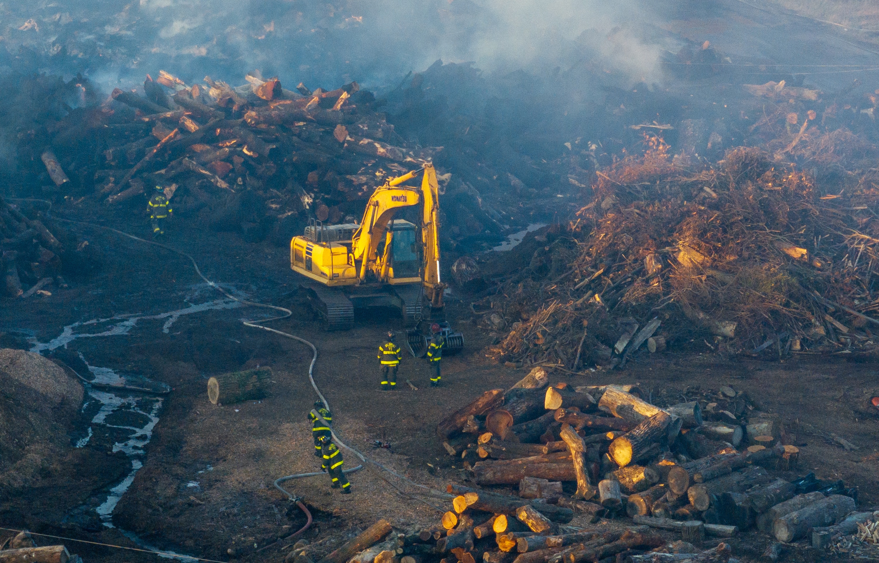 Heavy equipment was brought in to help firefighters seek out hot spots.