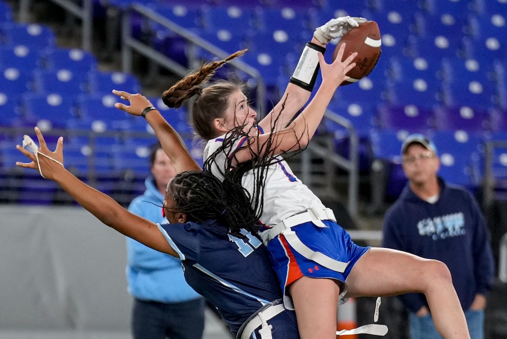 Boonsboro’s Annabel Fletcher (1) nearly intercepts a pass intended for Clarksburg’s Destiny Turner (11) during the 2024 Maryland High School Girls Flag Football Championship